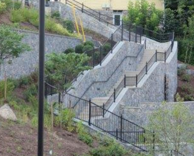 A stormwater flume connects flow from Main Street to a series of BMPs in the staircase. Photo credit: BUBBA Awards.